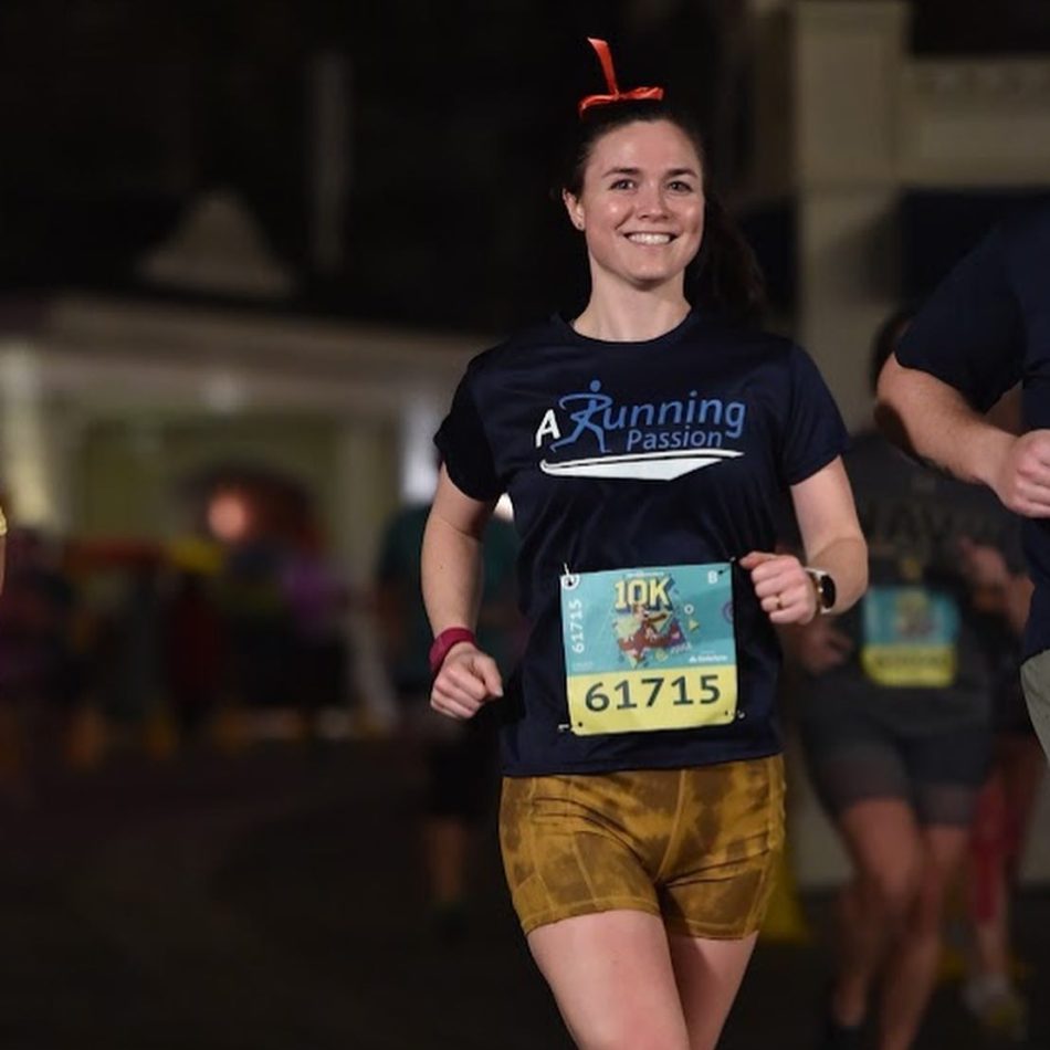 A woman running in an ARP shirt